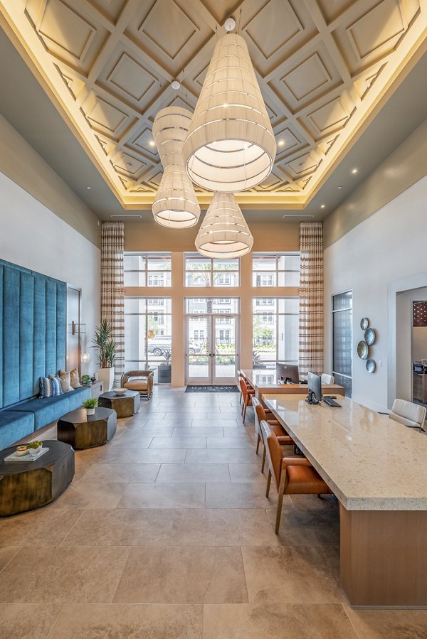 Clubhouse featuring modern design and comfortable seating at Alta Deco Apartments