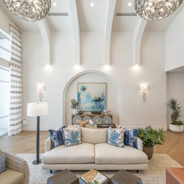 Clubhouse with modern furnishings at Alta Deco Apartments featuring luxury amenities