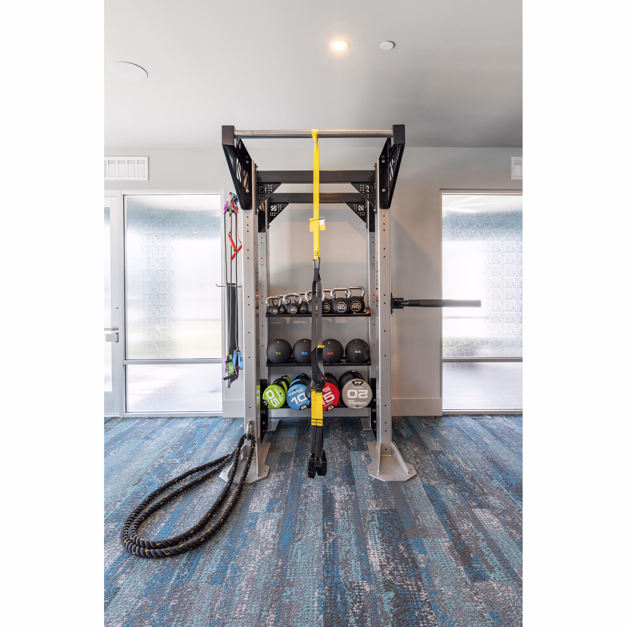Fitness center with modern equipment at Alta Deco Apartments for active lifestyles