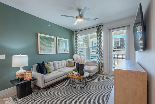 Living room at Alta Denton Station Apartments