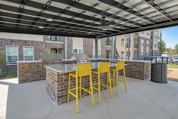 Modern fitness center with cardio and weight equipment at Alta Denton Station luxury apartments