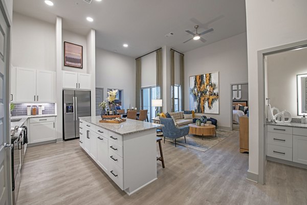 Cozy kitchen featuring modern appliances in Alta at the Farm luxury apartments