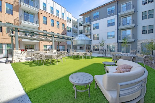 Recreation area with fitness equipment at Alta at the Farm Apartments, offering luxury amenities to enhance your lifestyle