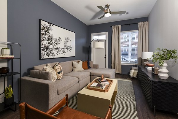 Spacious living room with modern decor in Alta Federal Hill Apartments