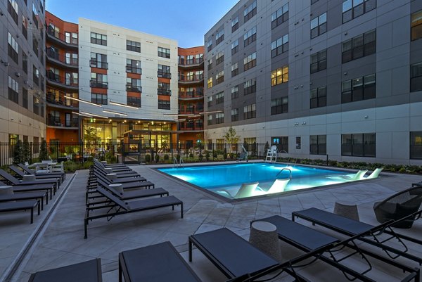 Rooftop pool with lounge seating at Alta Federal Hill Apartments, a Greystar luxury property in Baltimore