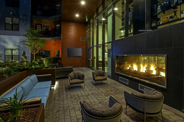 Chic outdoor courtyard at Alta Federal Hill Apartments featuring lush landscaping and comfortable seating in Baltimore