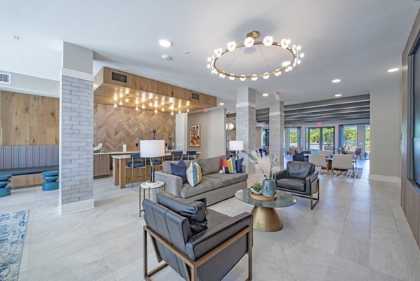 Clubhouse with modern seating and design elements at Alta Firewheel Apartments