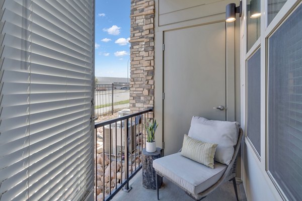 Scenic patio at Alta Green Mountain Apartments with mountain views, perfect for relaxation and outdoor dining