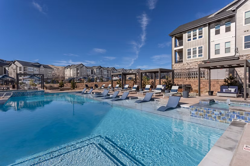 Alta Green Mountain Apartments: Luxurious pool with mountain views in a serene setting