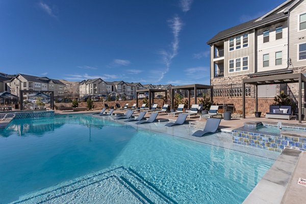 Alta Green Mountain Apartments: Luxurious pool with mountain views in a serene setting
