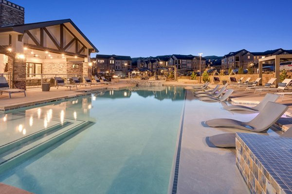 Pool with mountain views at Alta Green Mountain Apartments