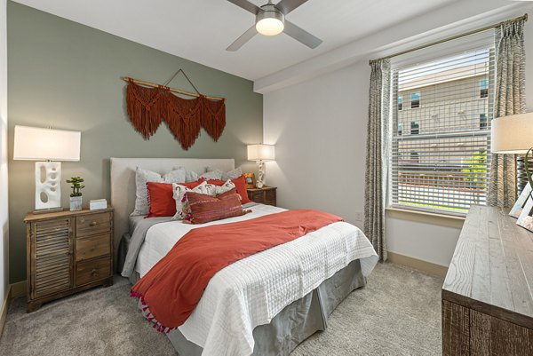 Luxury bedroom featuring elegant decor at Alta Landing Apartments
