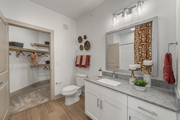 Bathroom with modern fixtures and sleek design at Alta Landing Apartments