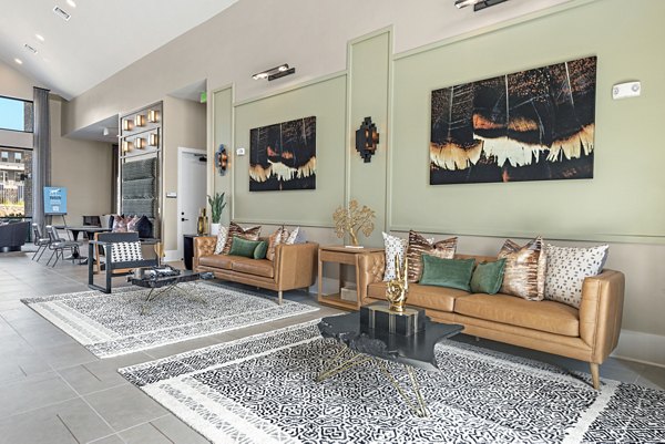 Clubhouse at Alta Landing: Modern space with stylish seating and large windows for community events