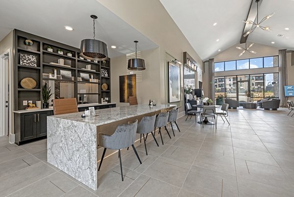 Modern clubhouse with lounge and meeting spaces at Alta Landing Apartments, a luxury community offering exceptional amenities