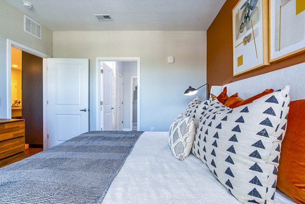 Luxurious bedroom with modern decor at Alta Longwood Apartments