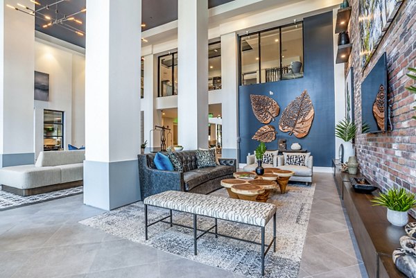 Clubhouse featuring modern furnishings and elegant decor at Alta Longwood Apartments
