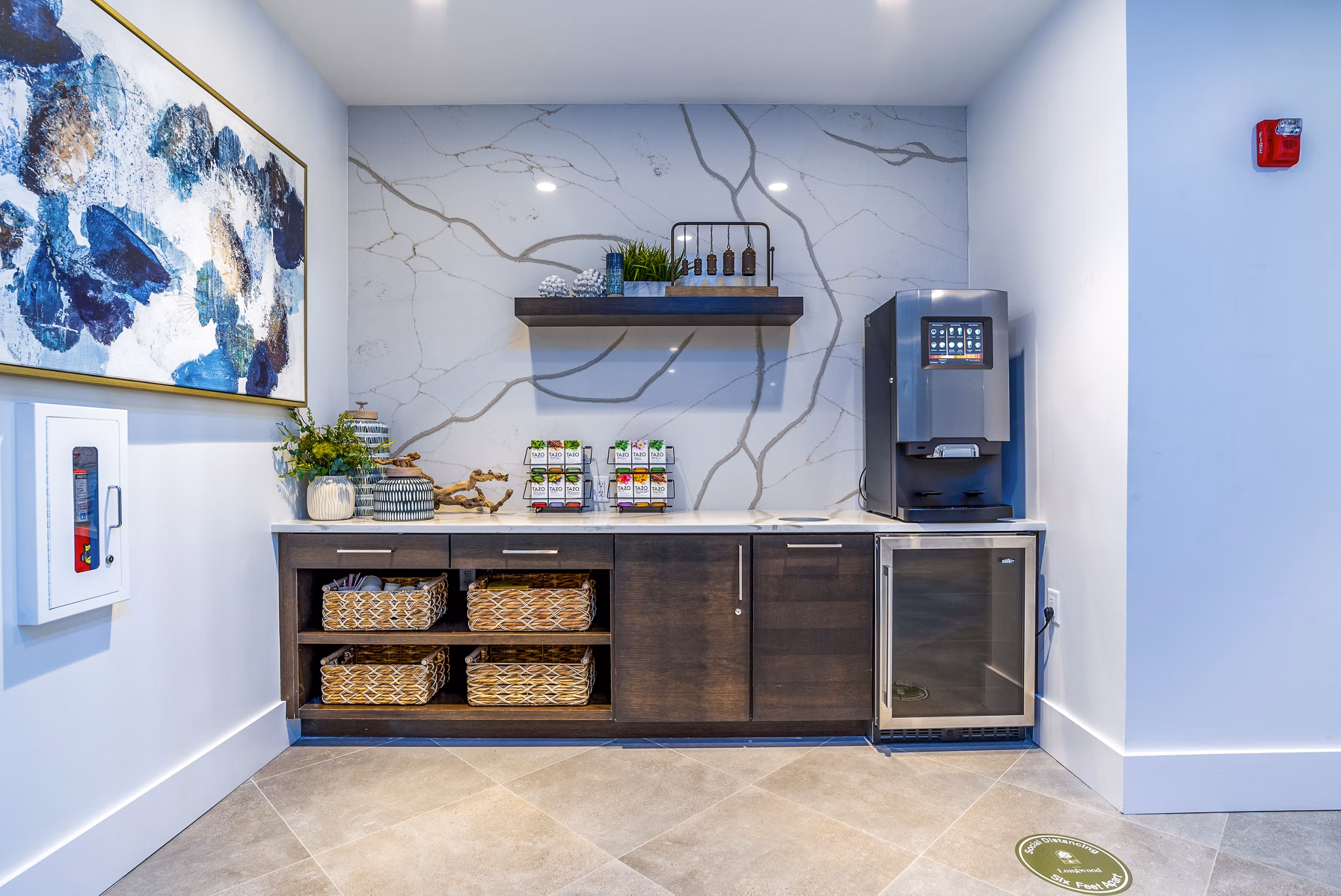 Welcoming clubhouse lobby at Alta Longwood Apartments with modern seating and stylish decor, perfect for relaxation and social gatherings