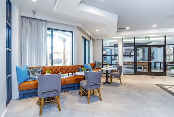 Elegant lobby with modern decor in Alta Longwood Apartments clubhouse
