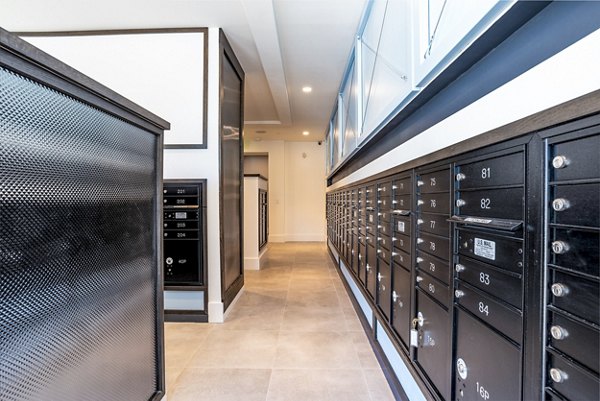 Mail room with secure package lockers at Alta Longwood Apartments for residents' convenience