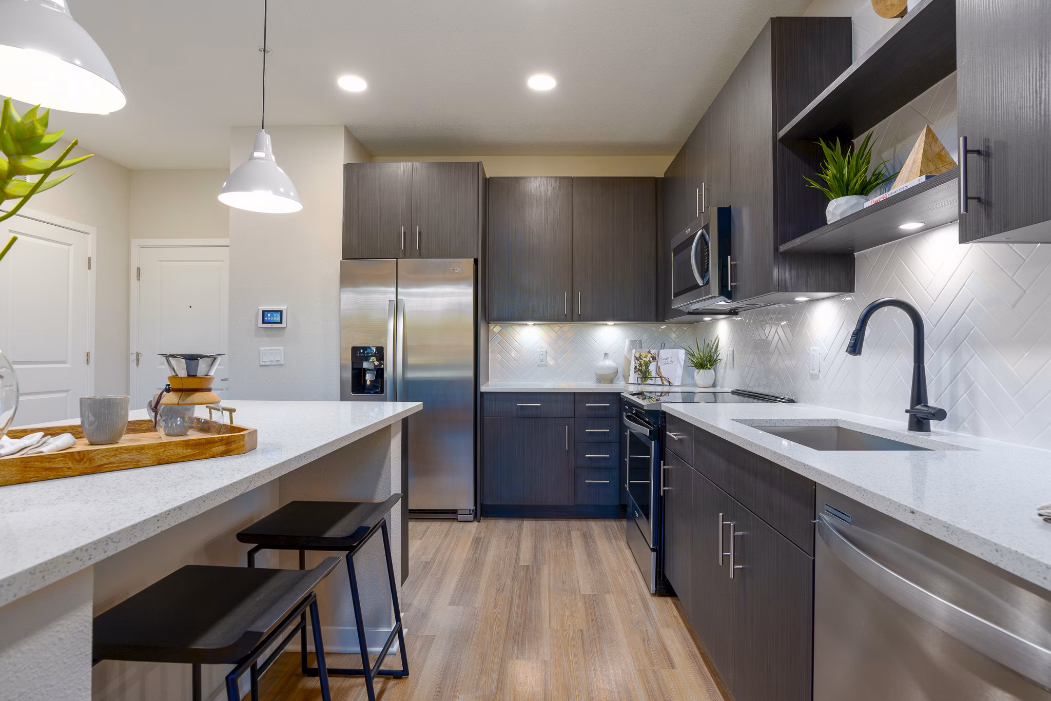 Spacious kitchen with modern appliances at Alta Longwood Apartments