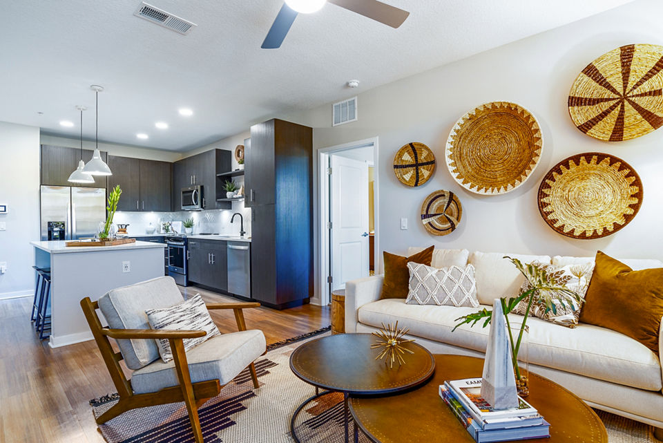 Spacious living room with modern decor in Alta Longwood Apartments