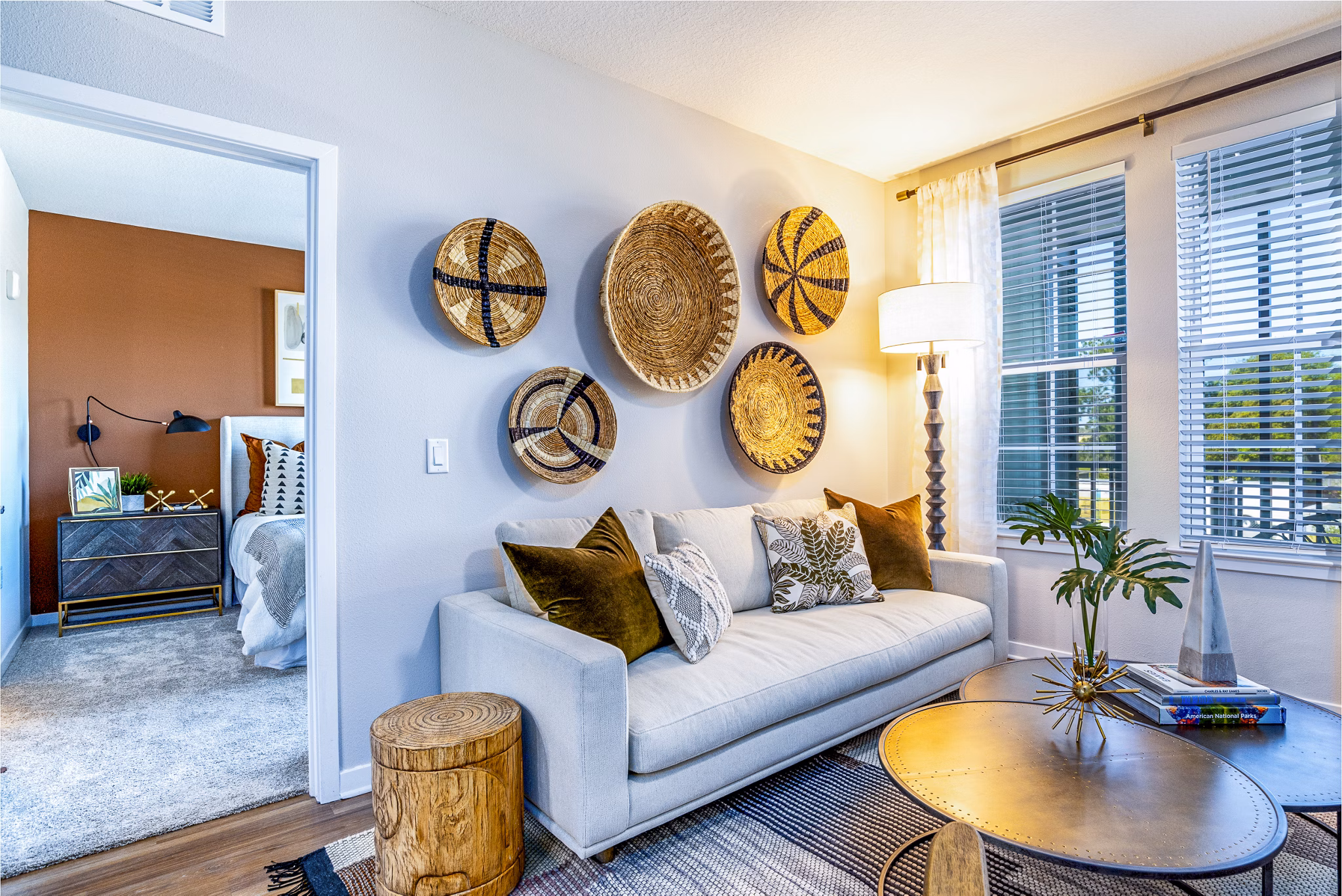Spacious living room with modern decor and natural light at Alta Longwood Apartments