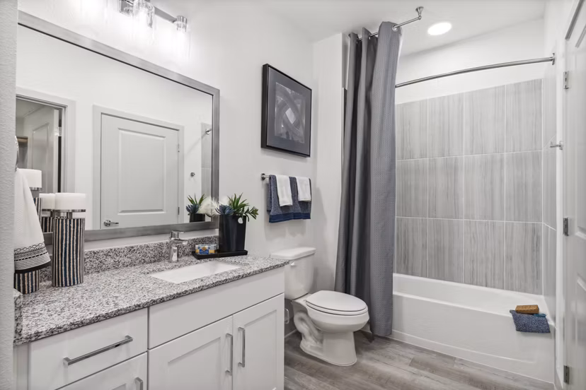 Modern bathroom with sleek fixtures at Alta Marine Creek Apartments