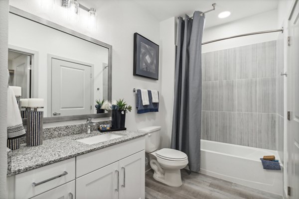Modern bathroom with sleek fixtures at Alta Marine Creek Apartments