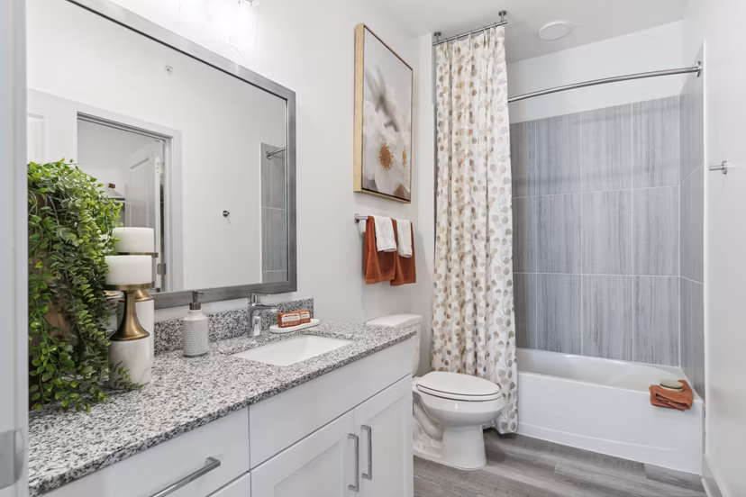Modern bathroom featuring sleek fixtures at Alta Marine Creek Apartments