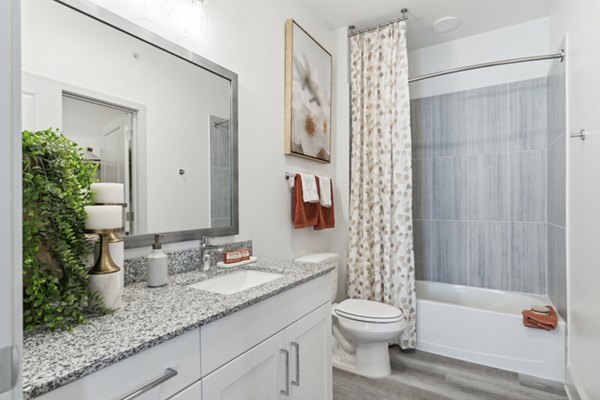 Modern bathroom featuring sleek fixtures at Alta Marine Creek Apartments