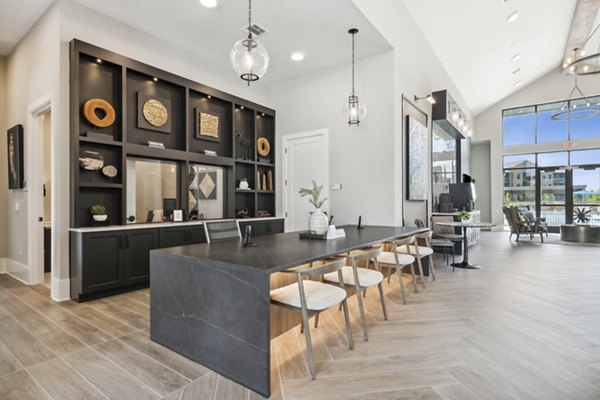Clubhouse at Alta Marine Creek Apartments featuring modern design and spacious seating areas in Fort Worth, Texas