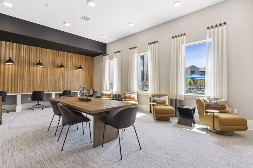 Clubhouse featuring modern design and lounge areas at Alta Marine Creek Apartments