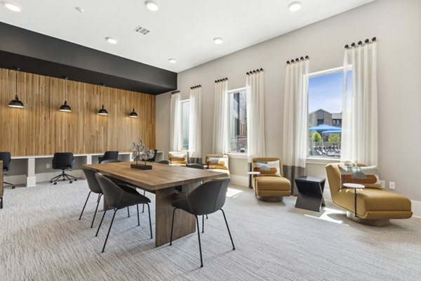 Clubhouse featuring modern design and lounge areas at Alta Marine Creek Apartments
