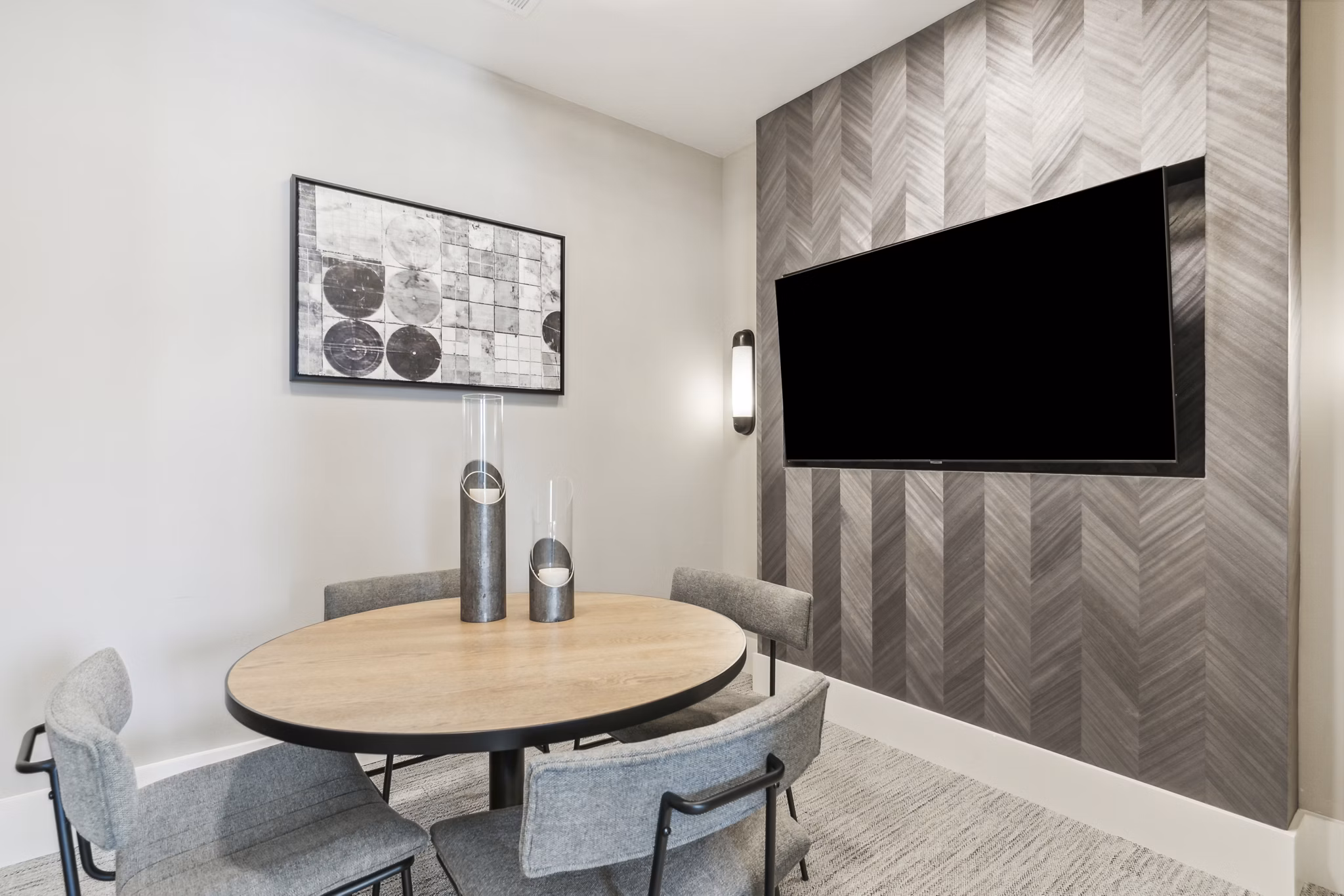 Meeting room with modern conference table and large windows at Alta Marine Creek Apartments