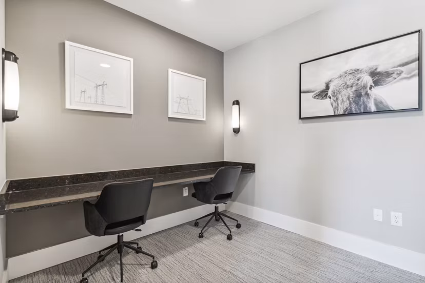 Business center with modern workstations at Alta Marine Creek Apartments