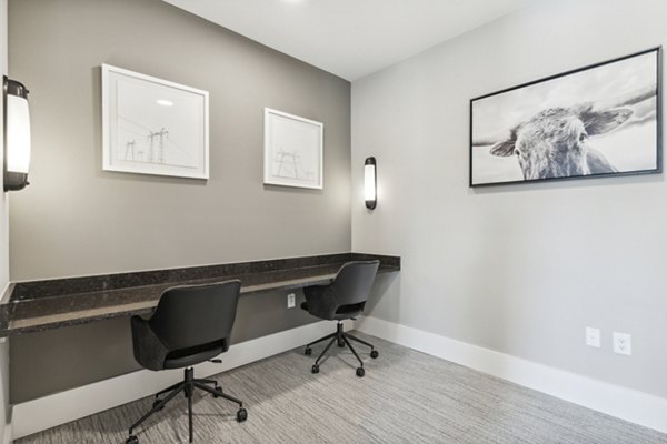 Business center with modern workstations at Alta Marine Creek Apartments