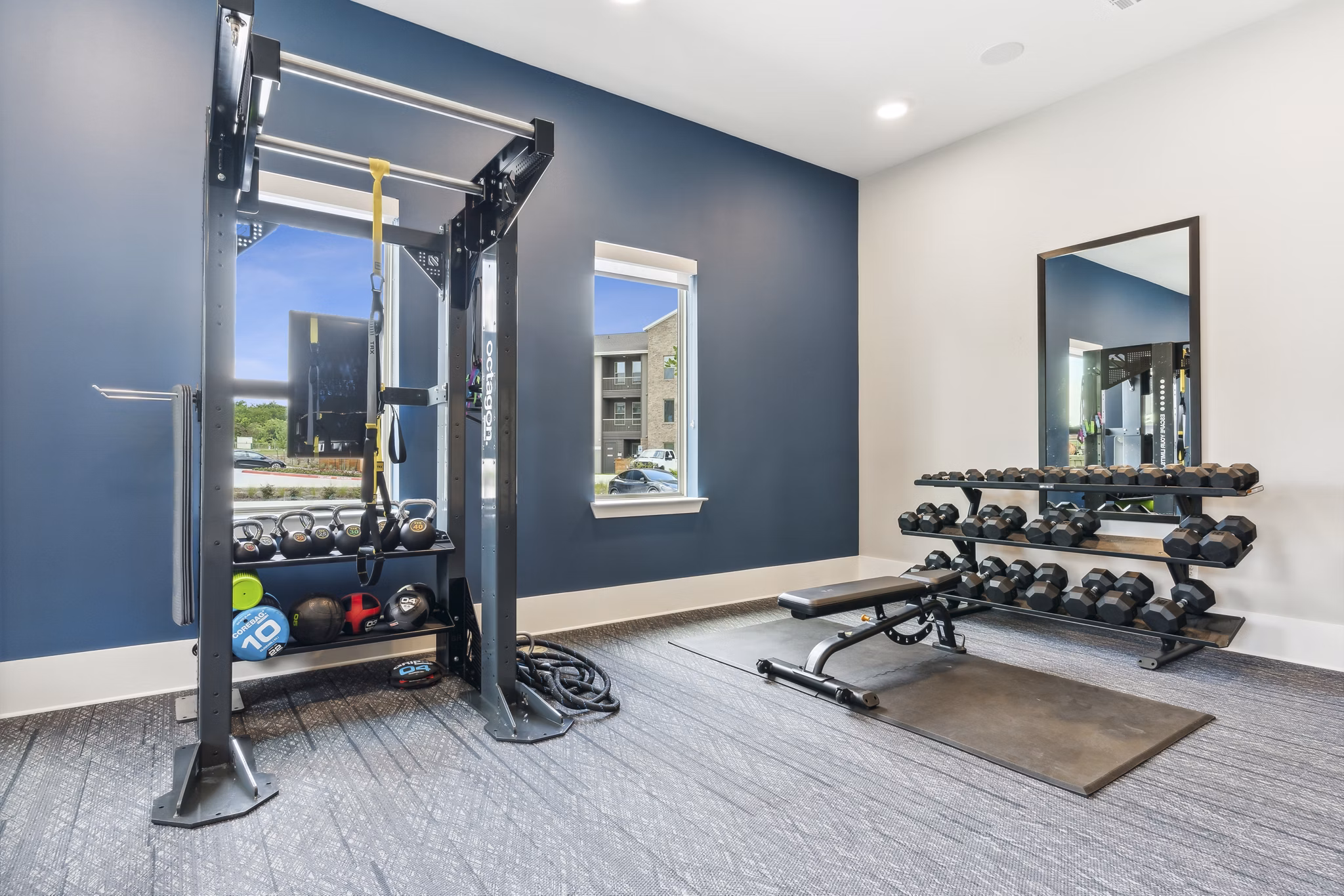 Modern fitness center with state-of-the-art equipment at Alta Marine Creek Apartments