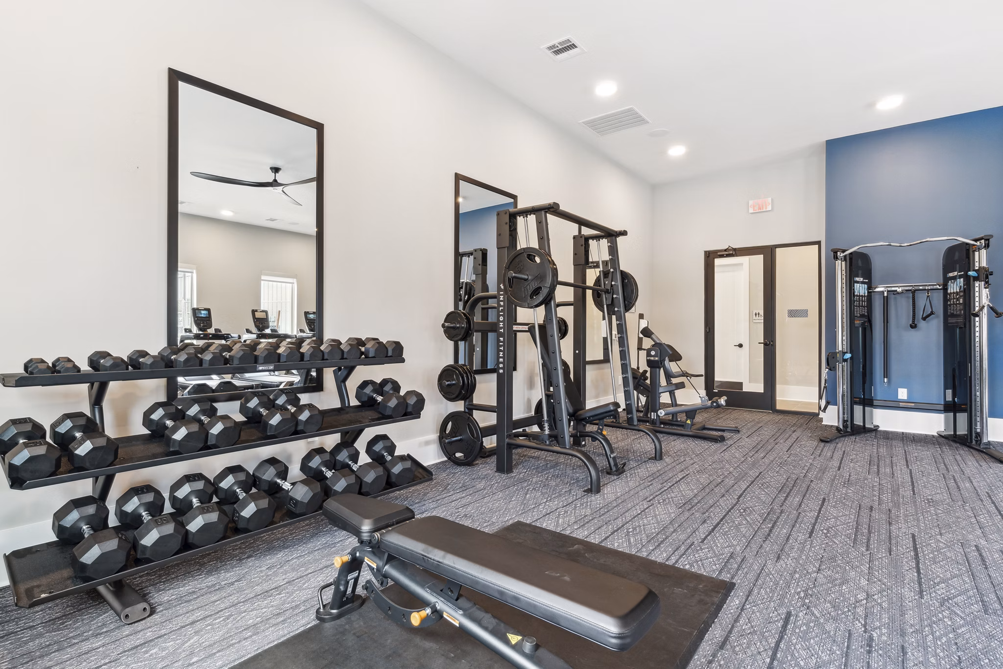 Modern fitness center with state-of-the-art equipment at Alta Marine Creek Apartments