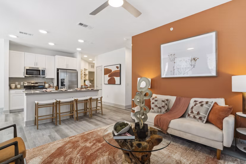 Living room featuring comfortable seating and modern decor at Alta Marine Creek Apartments