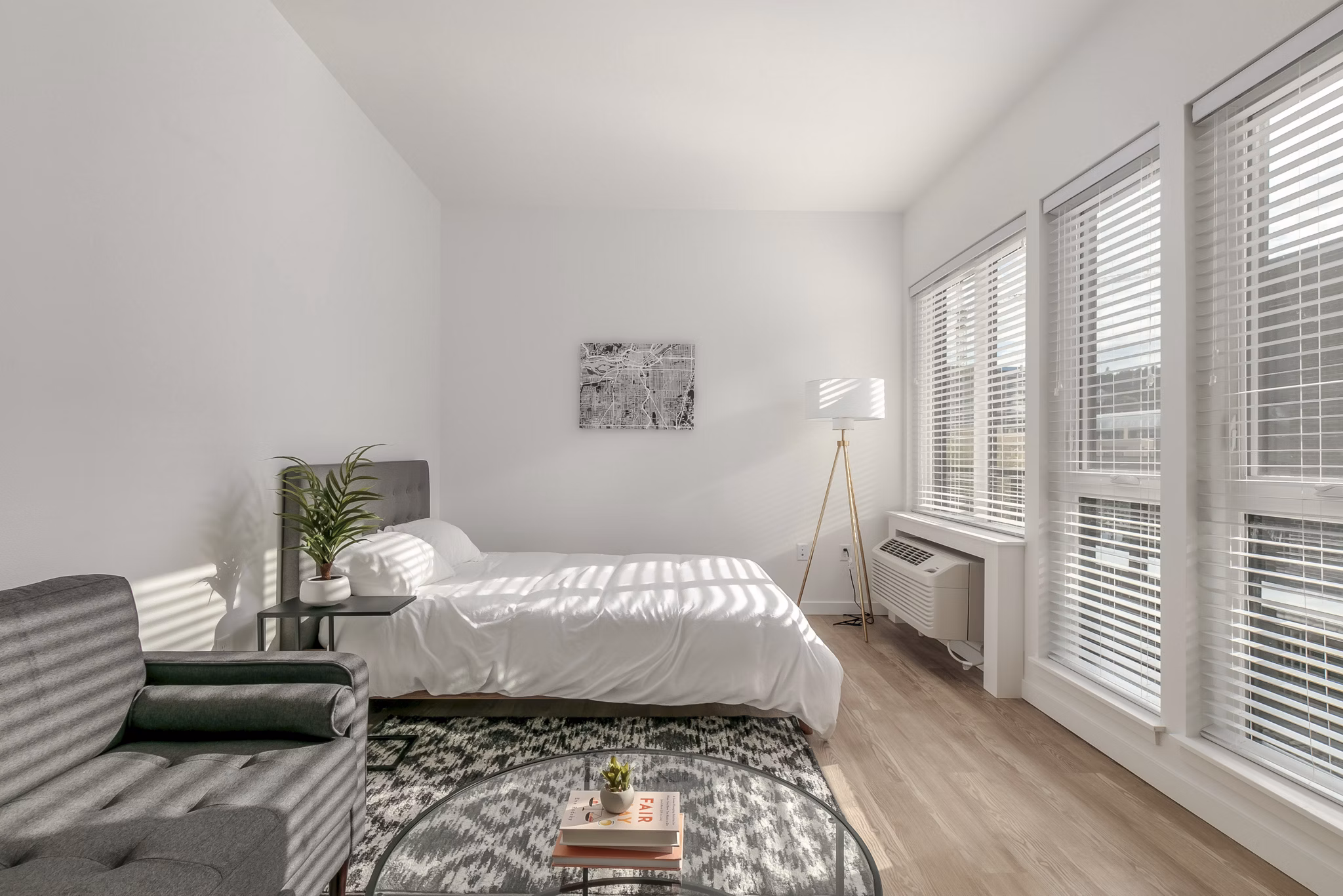 Cozy bedroom with modern furnishings at Alta Peak Apartments