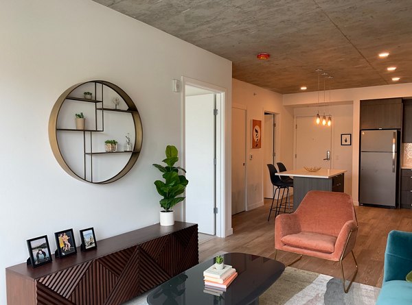 Alta Peak Apartments: Living area featuring modern design and luxury finishes