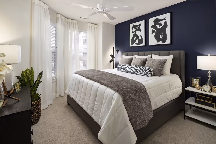 Elegant bedroom with modern decor at Alta Porter on Peachtree apartments