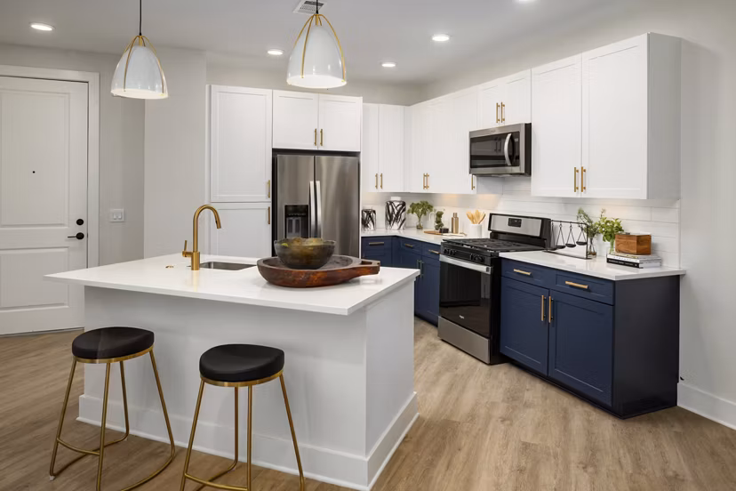 Modern kitchen with sleek cabinetry and stainless steel appliances at Alta Porter on Peachtree luxury apartments