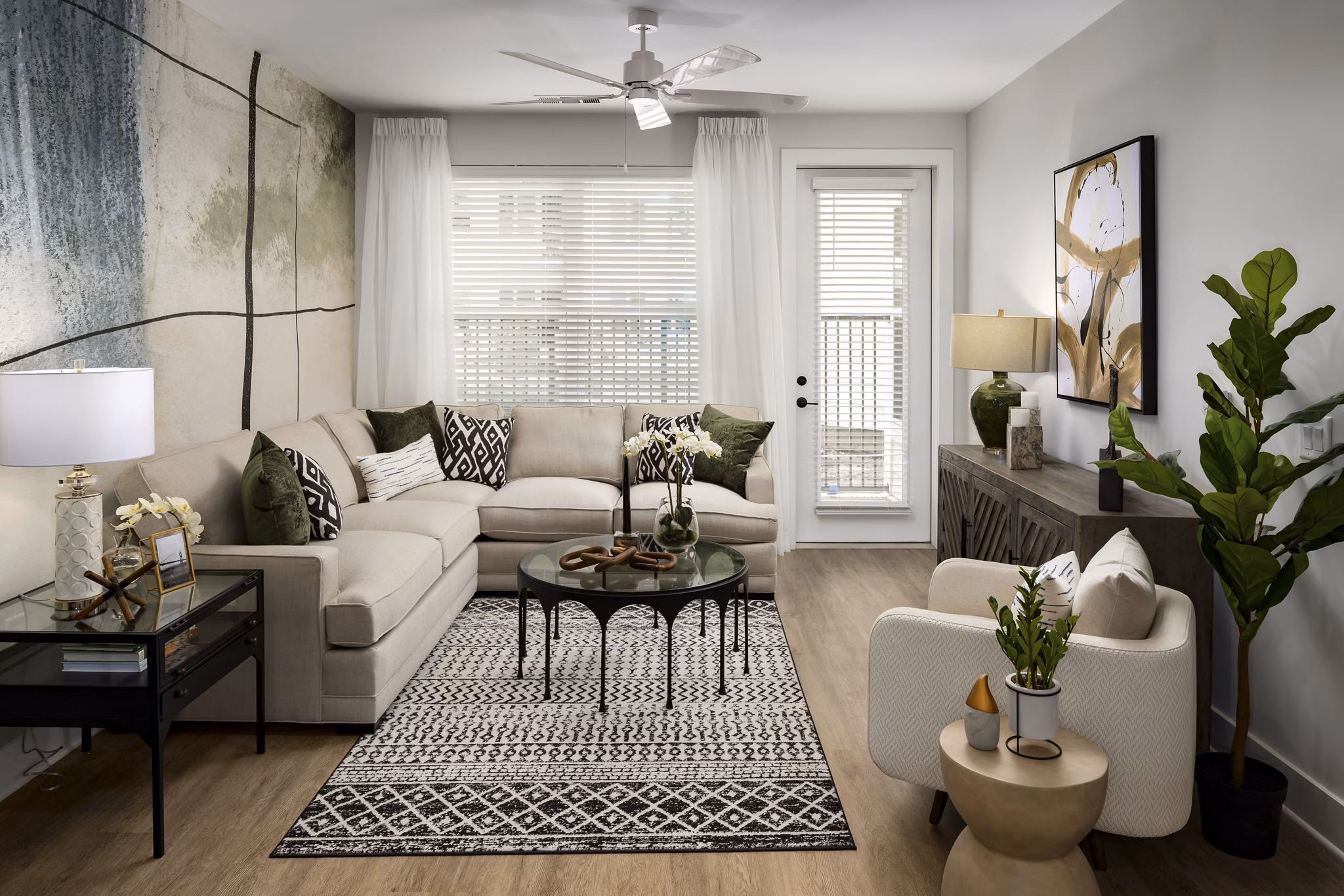 Spacious living room with modern decor and natural light at Alta Porter on Peachtree apartments