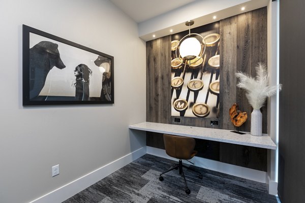 Clubhouse with modern decor and seating at Alta River Oaks Apartments