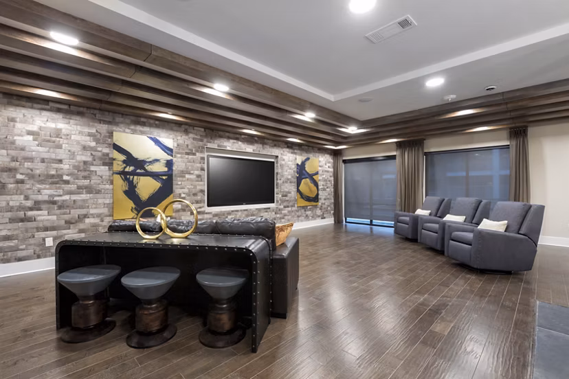 Clubhouse with modern design and stylish seating in Alta River Oaks Apartments
