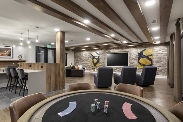 Elegant clubhouse with modern furnishings at Alta River Oaks Apartments, perfect for hosting events in a luxurious setting