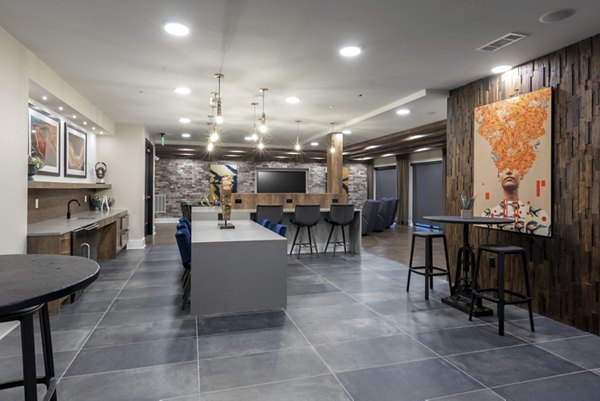 Modern clubhouse with lounge seating at Alta River Oaks Apartments