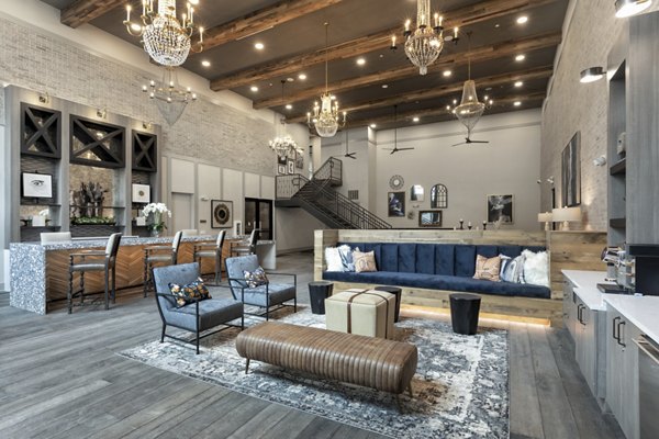 Clubhouse featuring modern decor and seating at Alta River Oaks Apartments in luxury Houston community